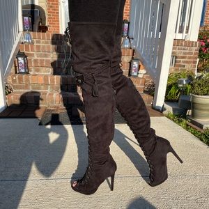 Thigh high heeled boots
